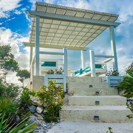 بروفيدنسياليس Modern Cottage With Chalk Sound Views المظهر الخارجي الصورة