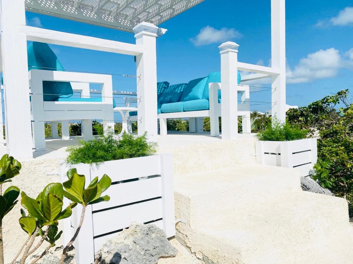 بروفيدنسياليس Modern Cottage With Chalk Sound Views المظهر الخارجي الصورة